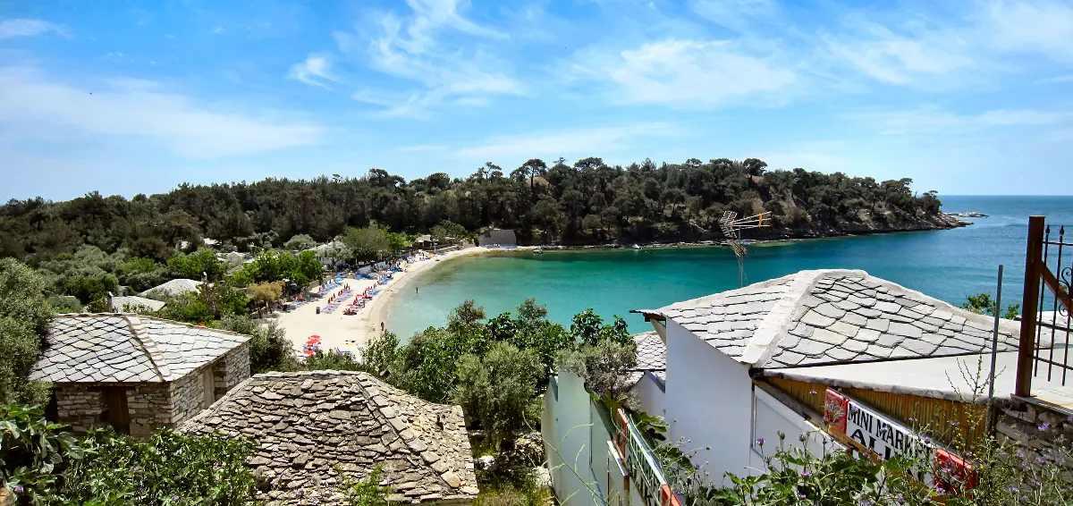 The twin bays at Aliki on Thassos, pines running down to clear shallow water
