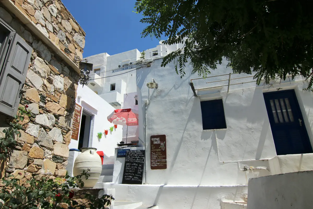 A lane climbing to the Kastro on Sifnos between whitewashed houses