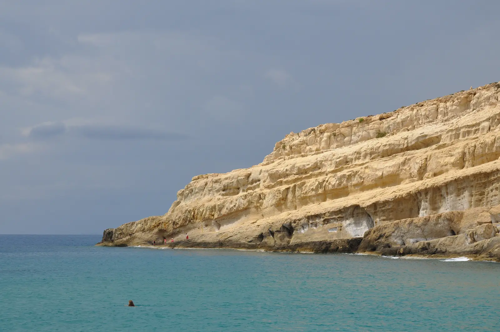 Matala: a cliff full of caves, and the decade that made it famous