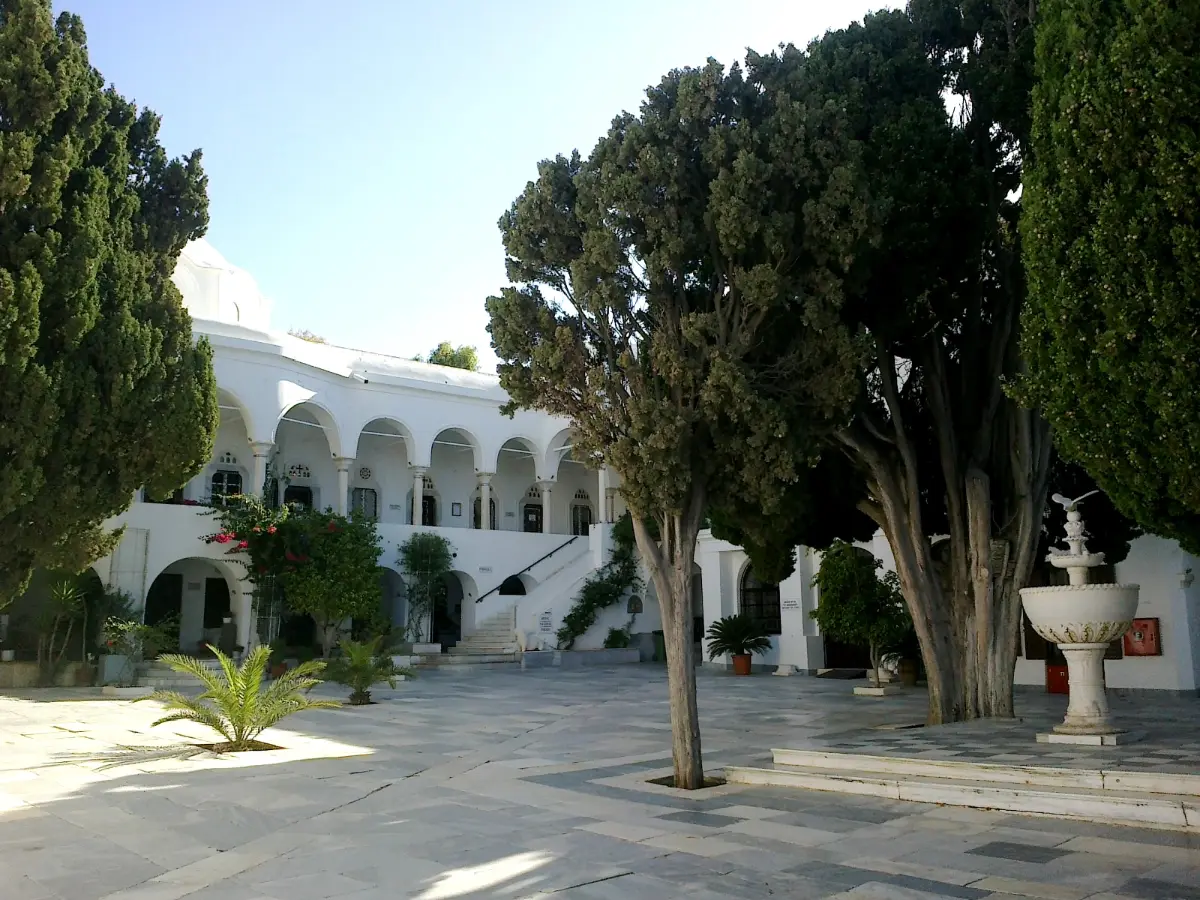 The arcaded courtyard of the Panagia Evangelistria church on Tinos