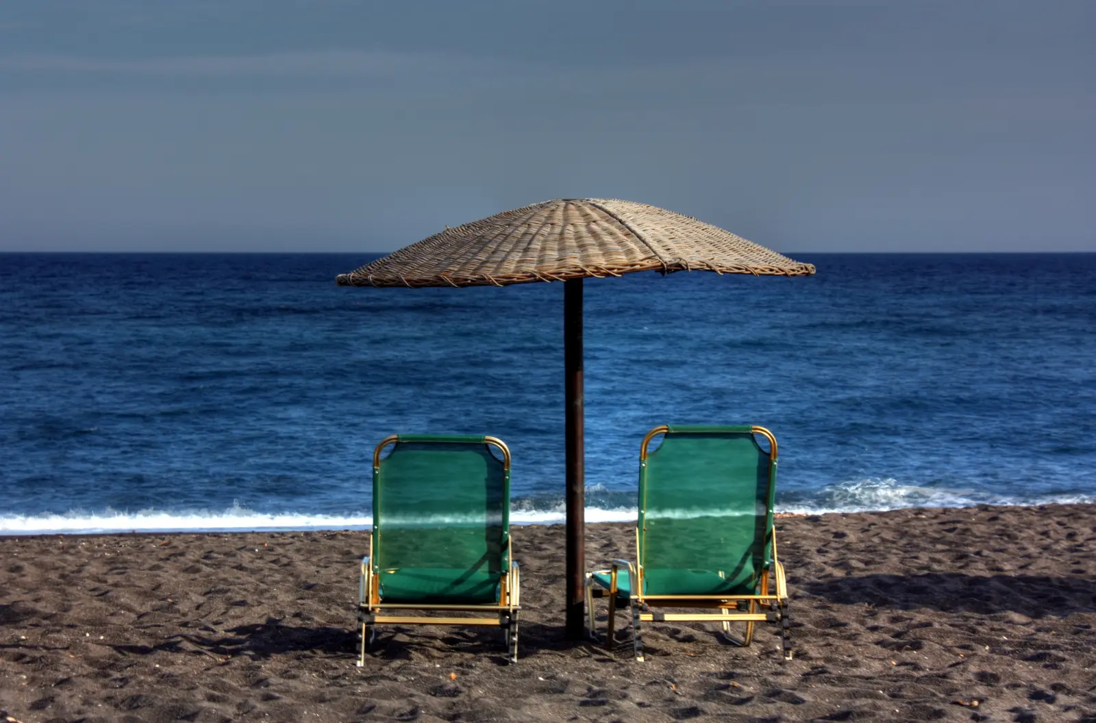 Perivolos: the beach-bar half of Santorini’s long black strip