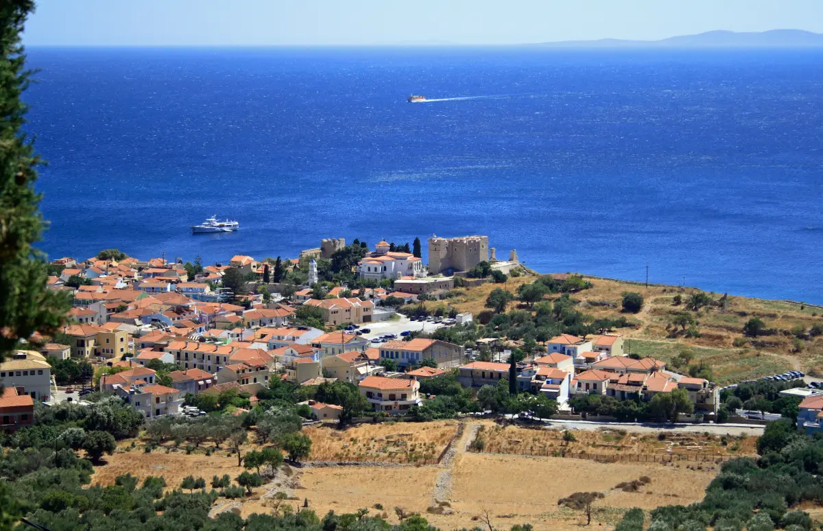 Pythagorio on Samos, tiled roofs above a deep blue bay