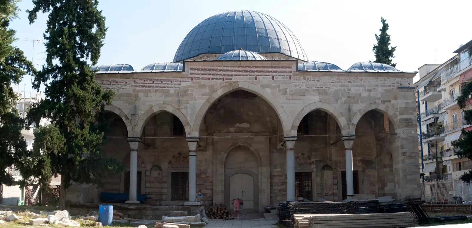 Serres: a plain, a fortress hill, and a cave with a train in it