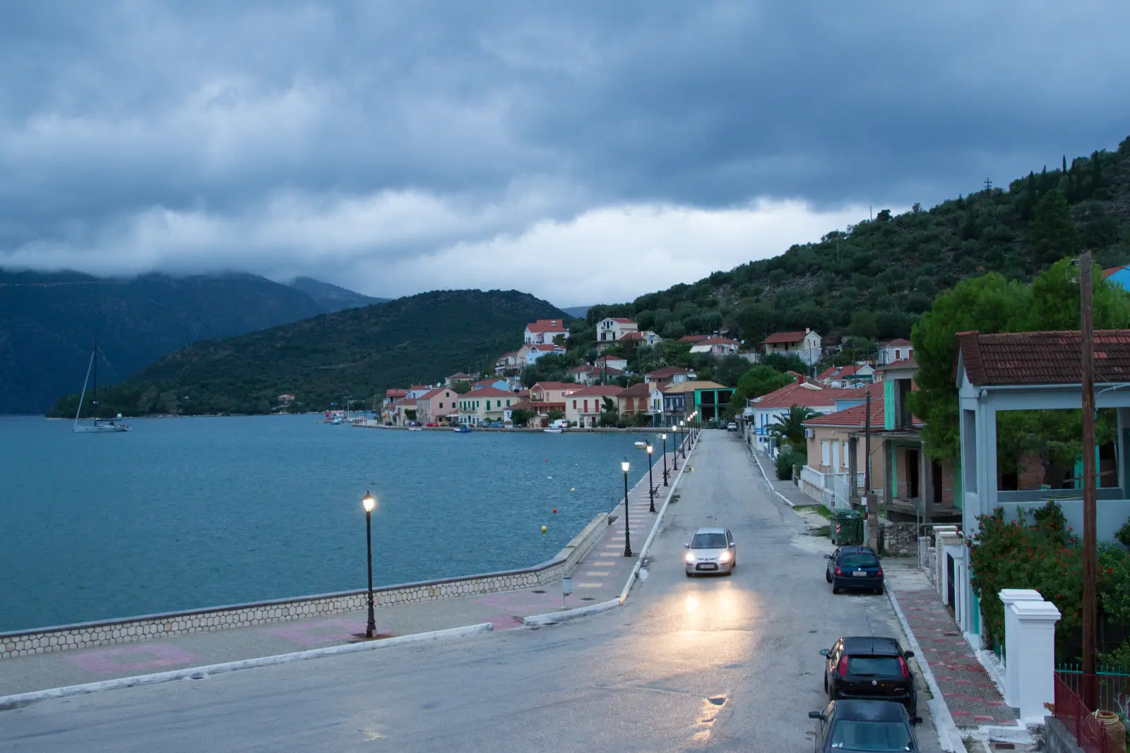 The waterfront at Vathy on Ithaca, the bay narrowing behind the town