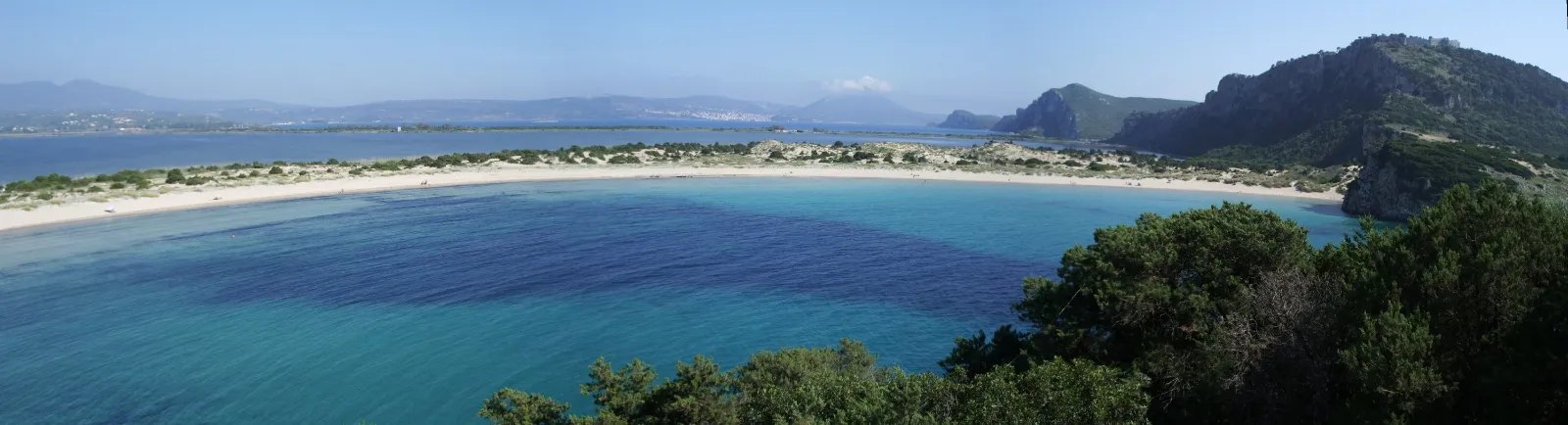 Voidokilia: a circle of sand with a lagoon behind it