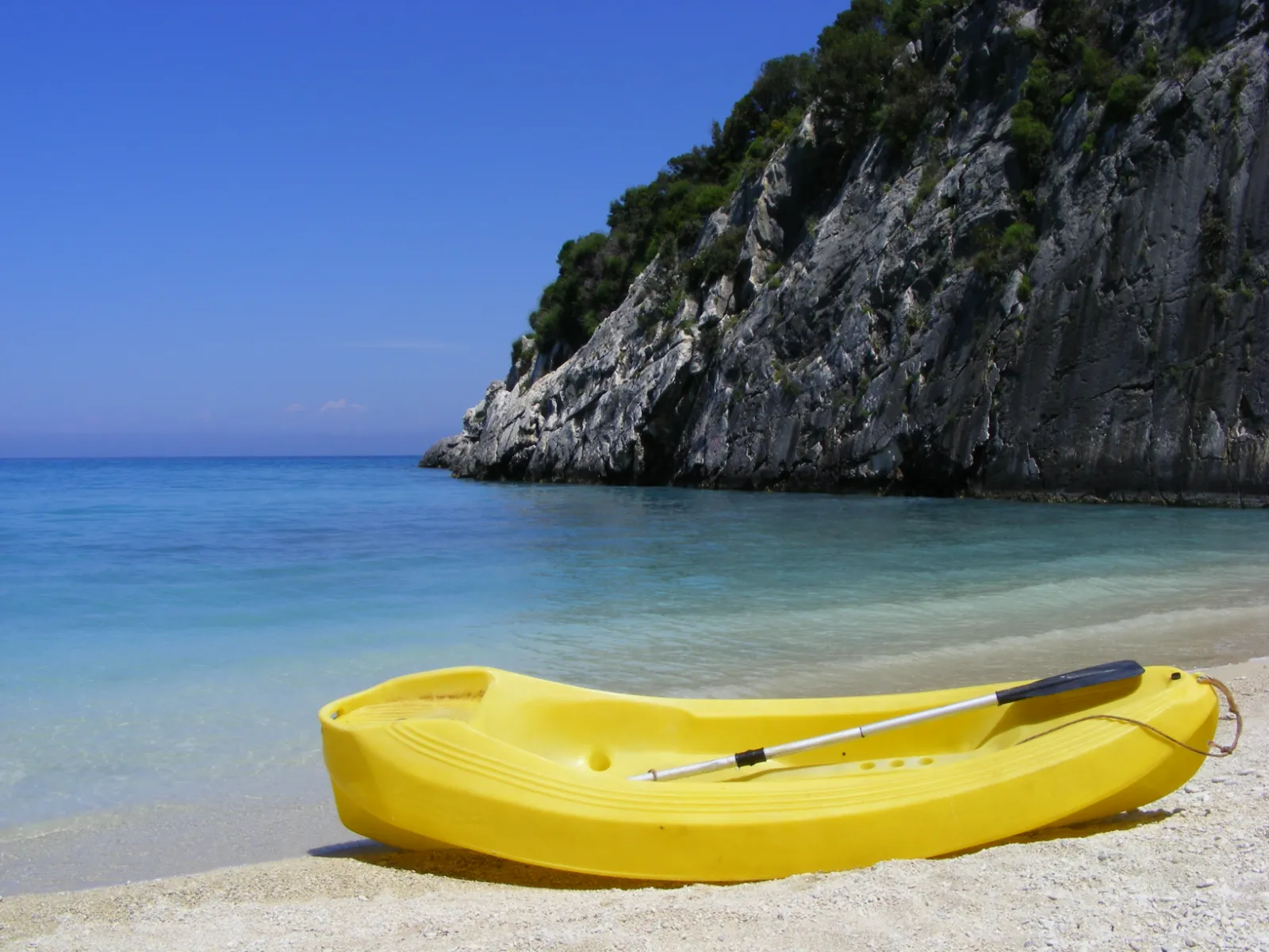 Xigia: a small cove where the cliff leaks sulphur into the sea